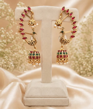 Peacock Ear Cuff Jhumka Earrings with Red Stones Peacock ear cuff jhumka earrings with red stones, green detailing and pearl drops