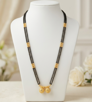 Long Two Line Black Bead Mangalsutra with Twin Gold Pendants Long two line black bead mangalsutra with gold bead clusters and twin round pendants