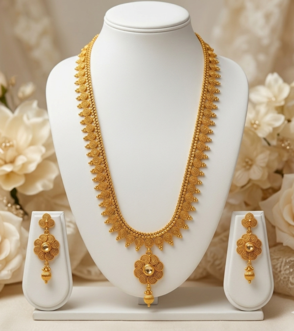 Antique Gold Long Necklace Set with Floral Pendant Antique gold long necklace set with floral pendant and matching earrings