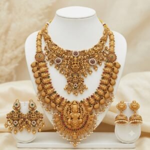 South Indian bridal jewellery set with layered temple necklaces and matching earrings