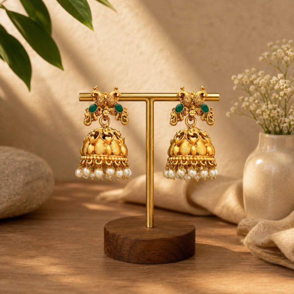 Matte Gold Finish Peacock Jhumka Earrings with Green Stones and Pearls