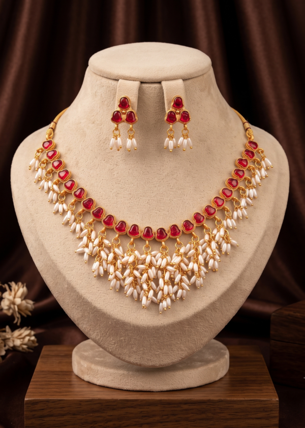 Ruby Red Stone Pearl Drop Necklace Set Ruby red stone pearl drop necklace set with matching earrings