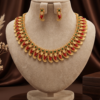 Ruby Red and Emerald Green Mango Design Matte Gold Finish Short Necklace Set with Earrings