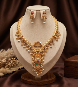 Naag Design Matte Gold Finish Necklace Set Matte Gold Finish Naag Design Necklace Set with Pearl Drops and Earrings